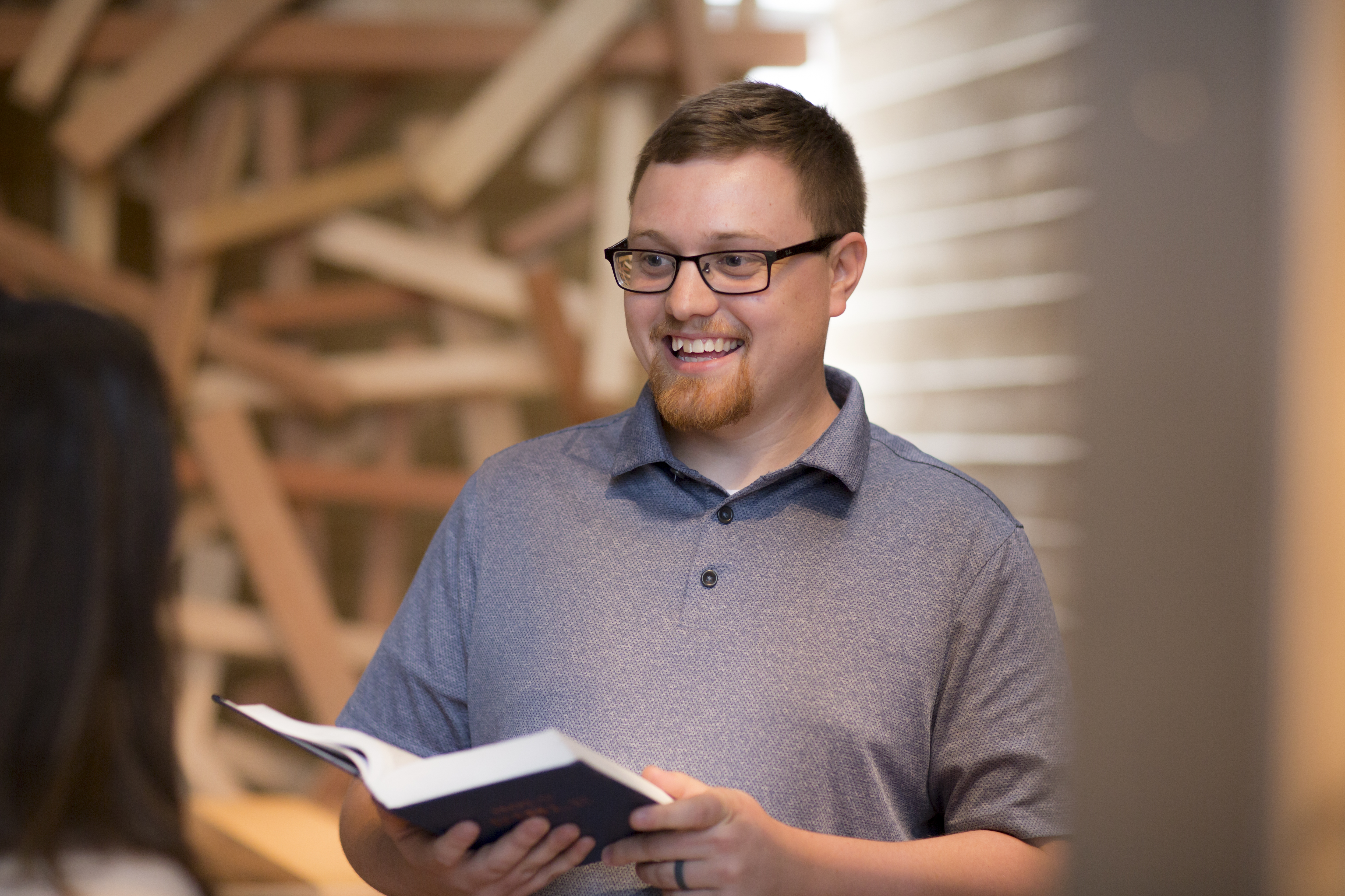 Professor teaches from the bible in Prayer Chapel.