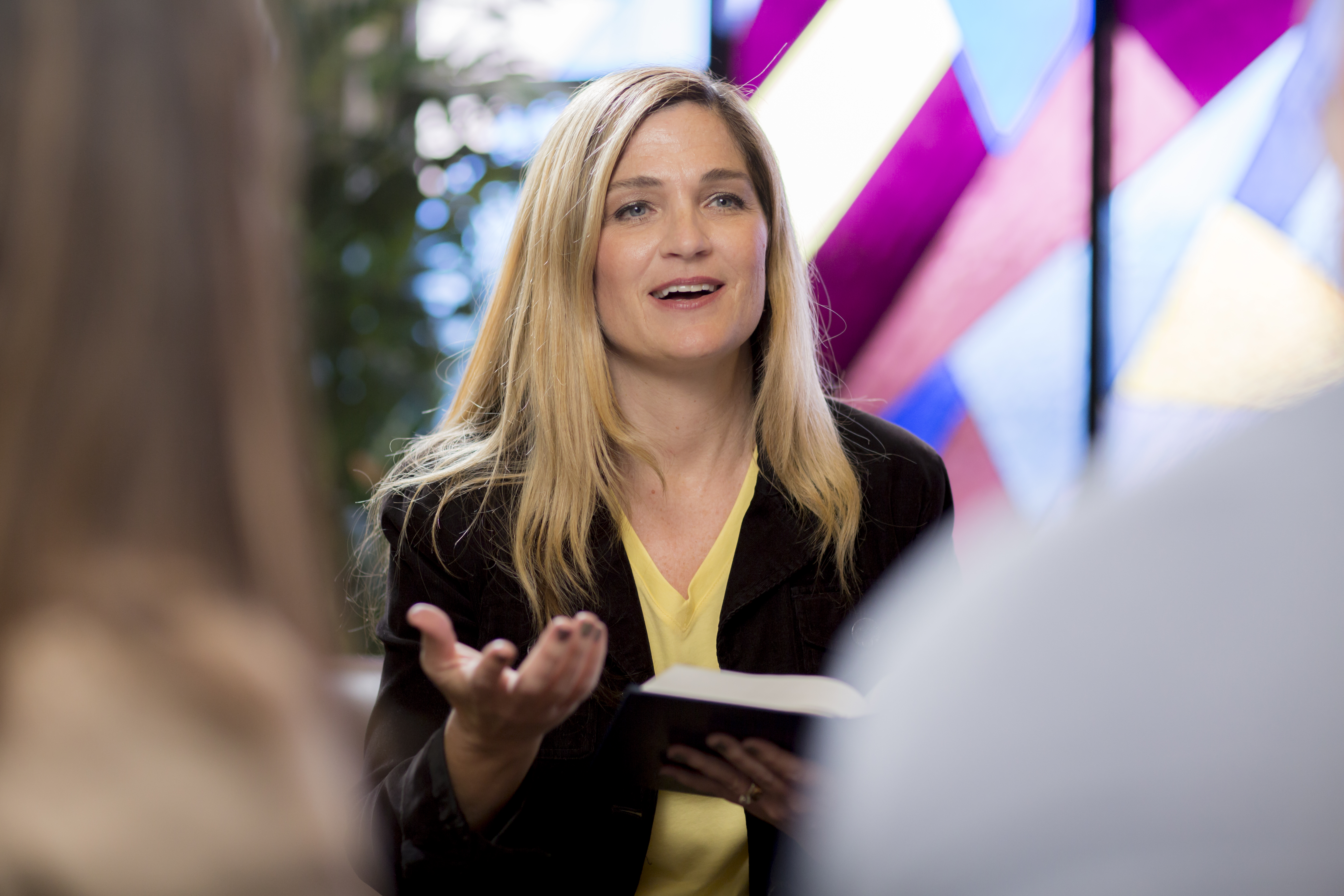Professor teaches from the bible in Smee Hall.
