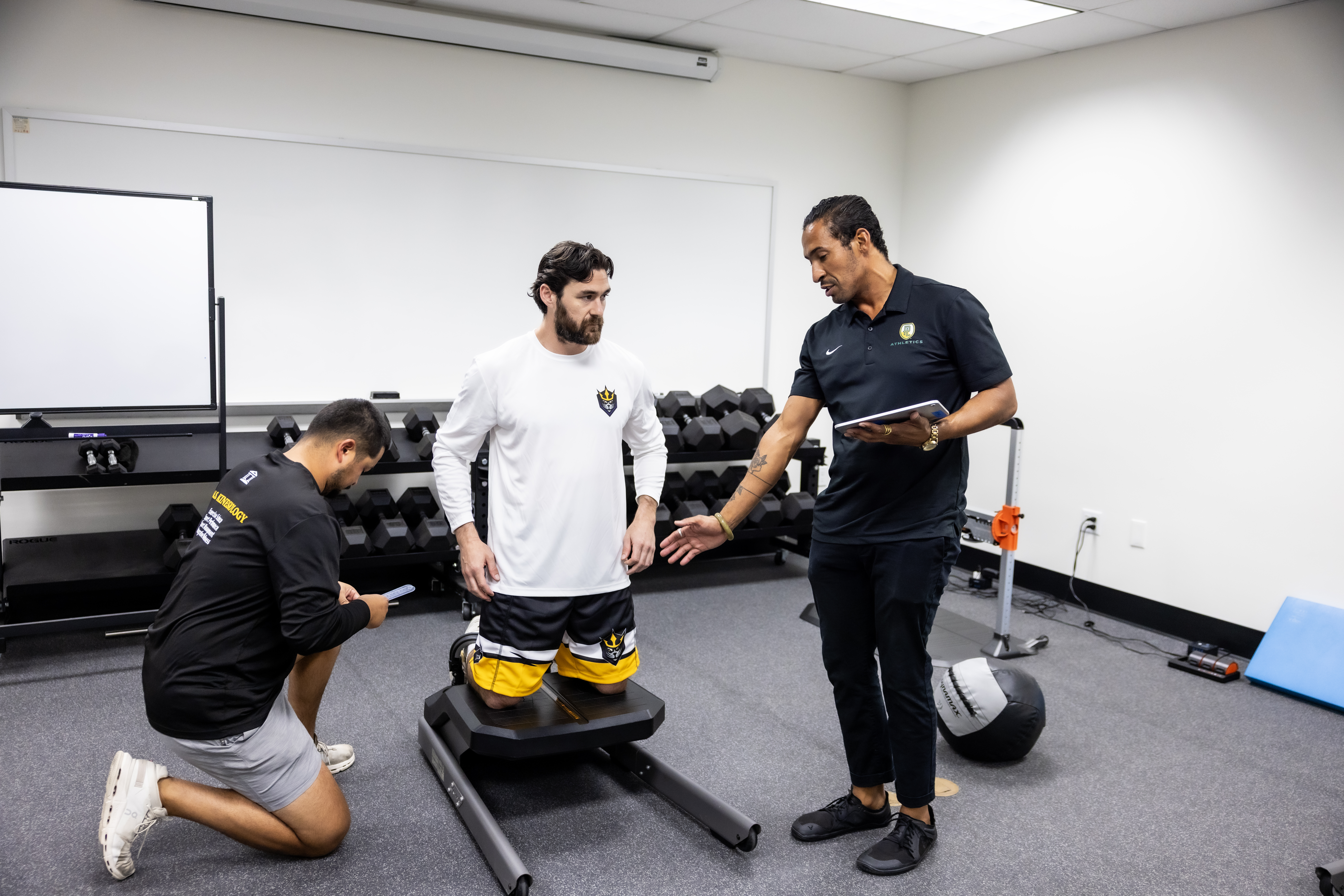 PLNU MS Kinesiology students work on a fitness assessment with an SD Seals player