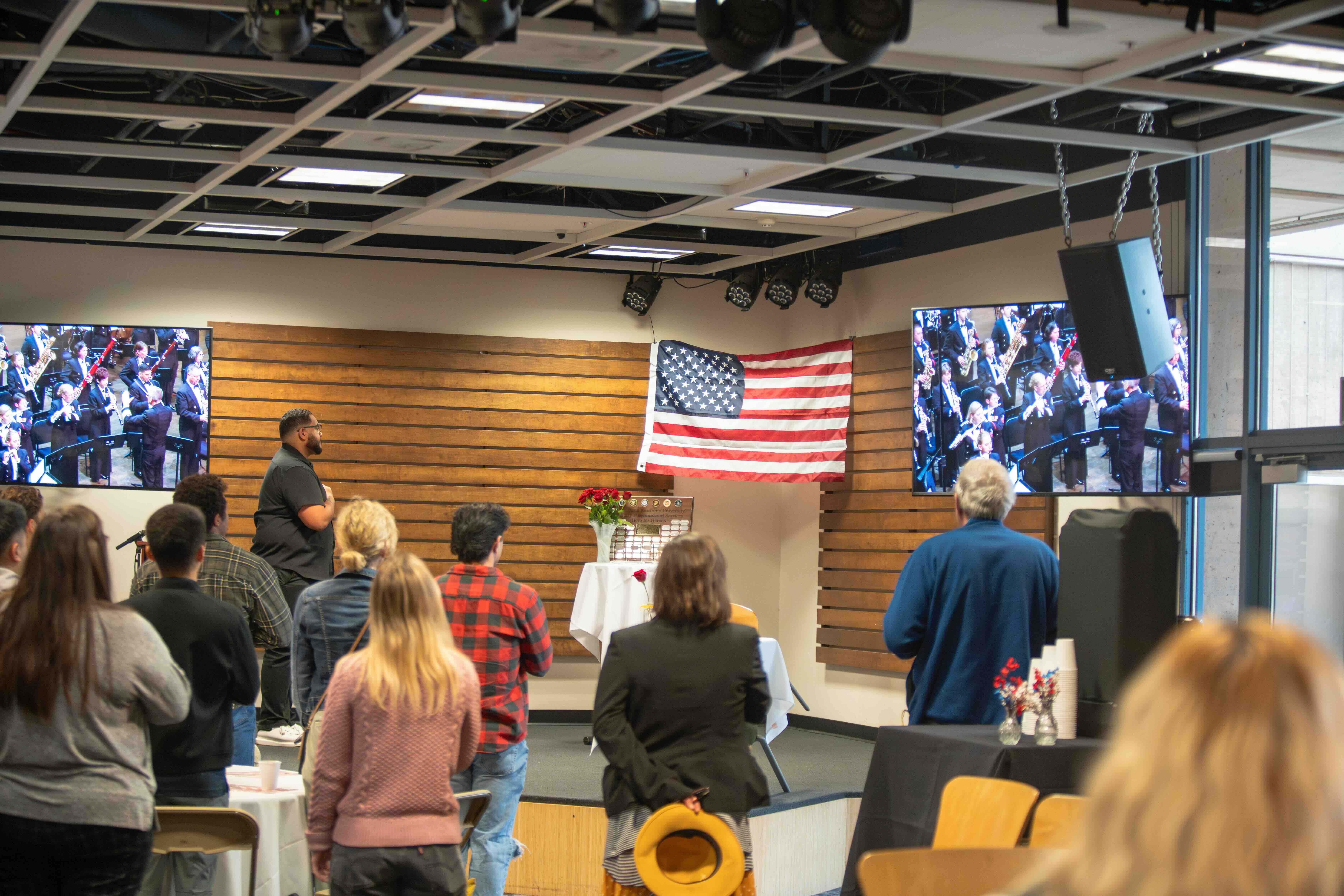 SVA members all stand and salute the American flag while the National Anthem plays at the 2026 Warrior's Breakfast.