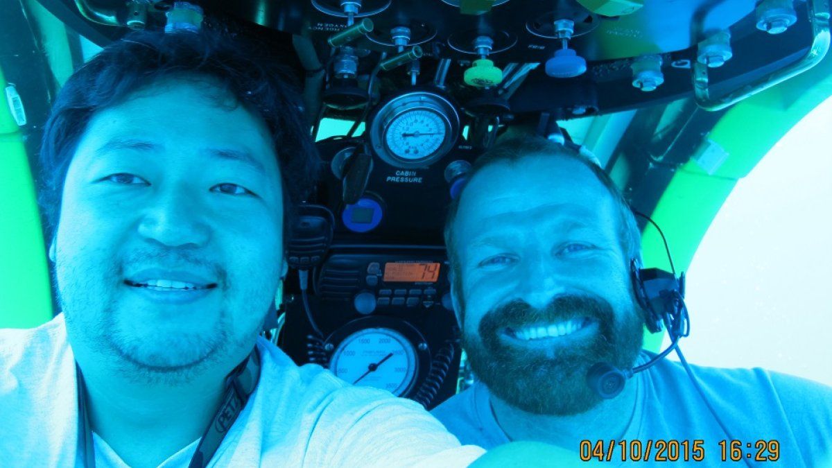 Walter Cho and a colleague in an underwater submarine