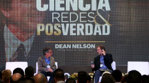 Dean Nelson speaking at a conference in Columbia