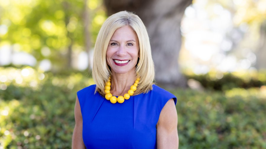 Portrait headshot of Melanie Hulbert.