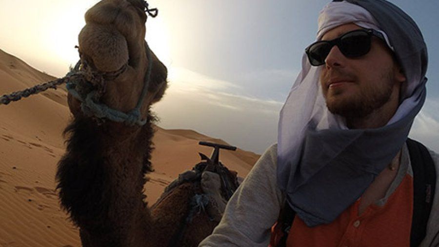 Student with a Camel Abroad