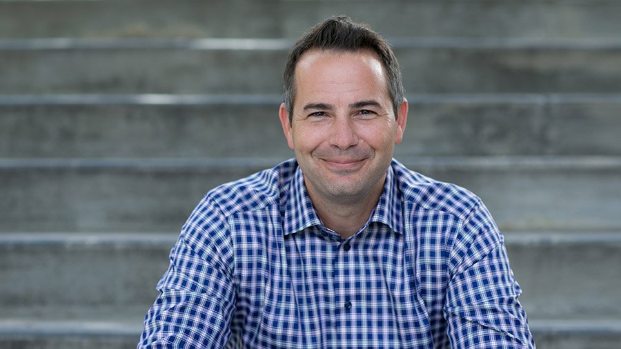 Headshot of G. James Daichendt