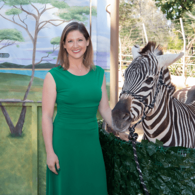 Picture of Laura Rice with a Zebra