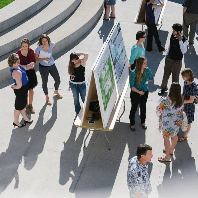 PLNU science students present their research findings on the outside plaza of Lator Hall.