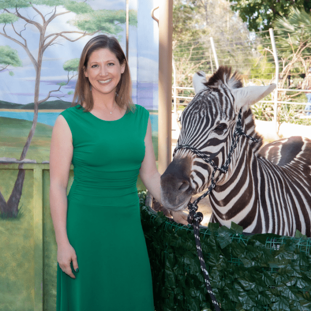 Picture of Laura Rice with a Zebra