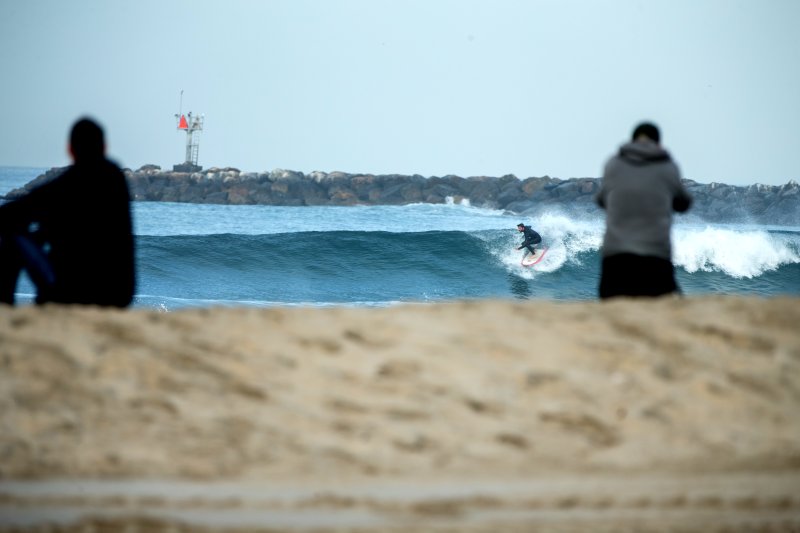 A surfer on a wave 