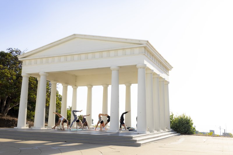 Students doing yoga in the Greek 