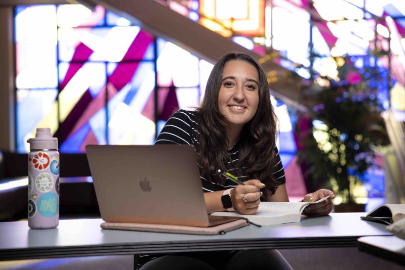 PLNU student works on her computer