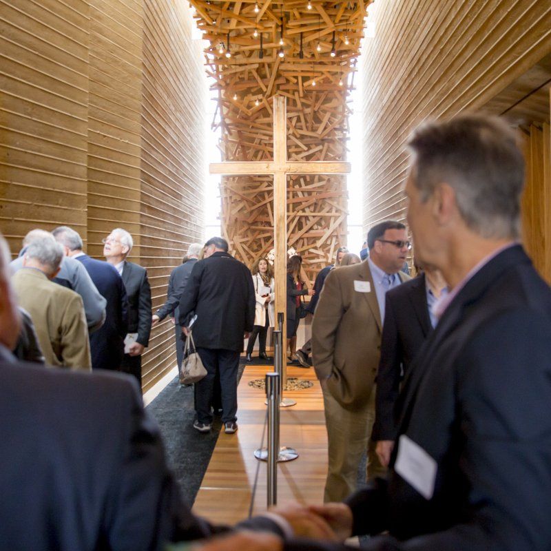 A large group tours the Prescott Prayer Chapel during its grand opening.