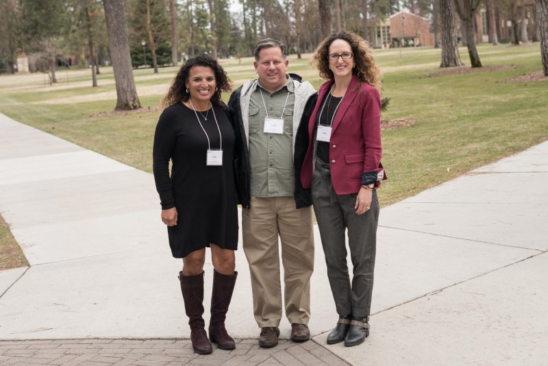 Jacque Mitchell, Scott Bennett, and Paula Cronovich at conference