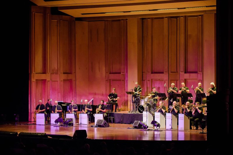 picture of jazz band with "coastal cities" big band music stands