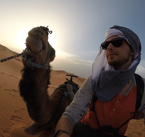 Student with a Camel Abroad