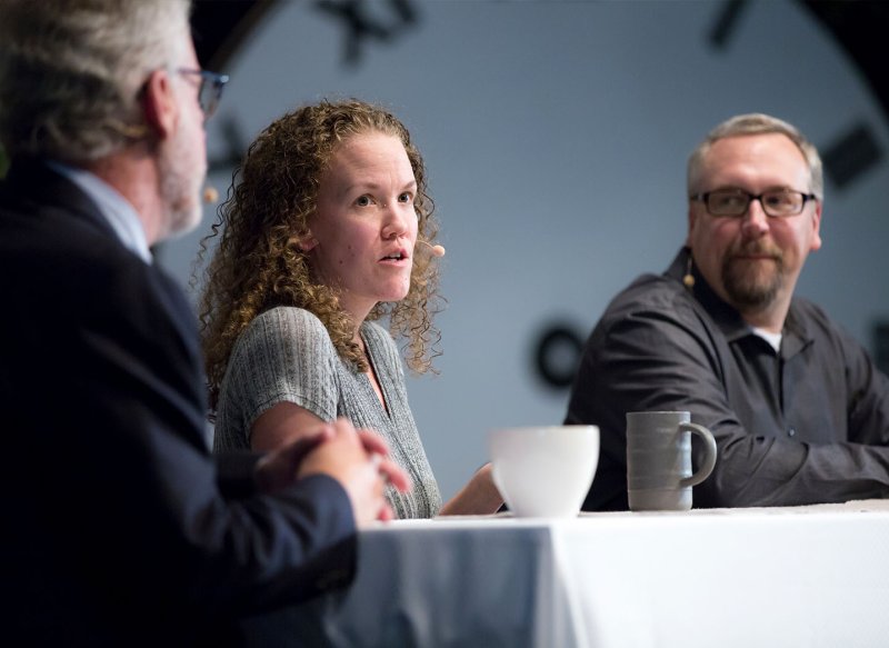 Ashby Rauch Kidd sits on a panel and answers questions from President Brower during Homecoming.