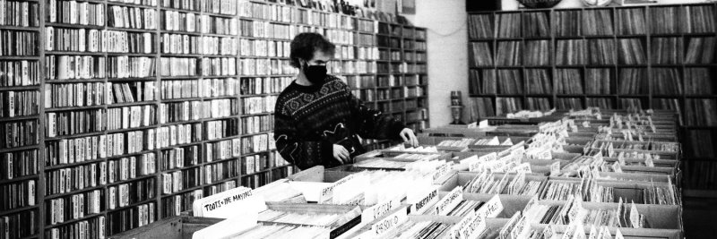 Student in vinyl records store