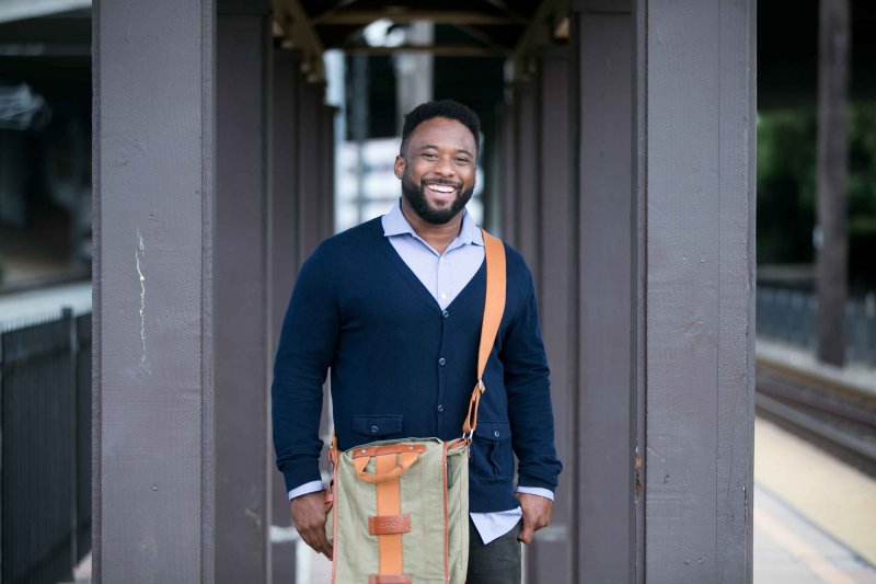 man smiling at the camera 