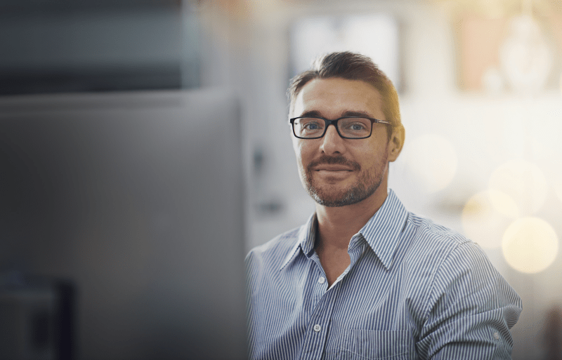 stock photo of guy at computer