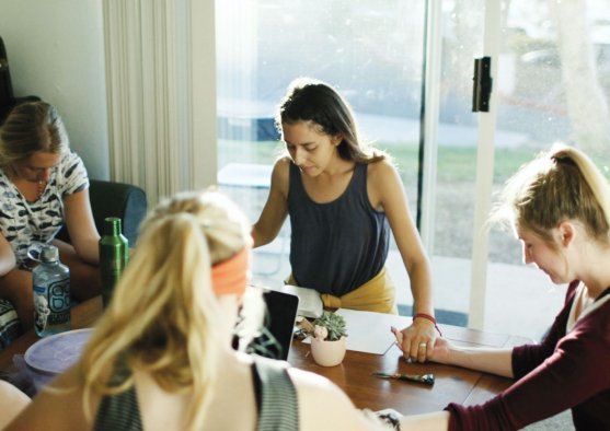 Female students praying at D group