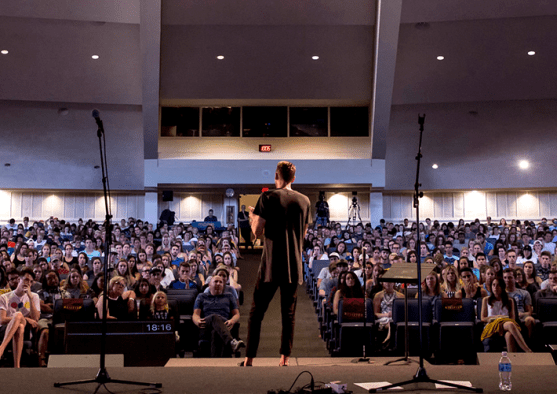 A man speaks during chapel.
