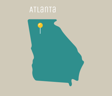 yellow pin on a cutout of the state of Georgia