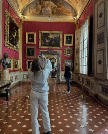 PLNU student taking a picture of a Parisian gallery while abroad.