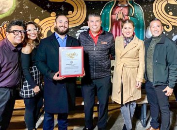 Presenting a Certificate on behalf of the California State Senate to the San Diego Latino Professionals.