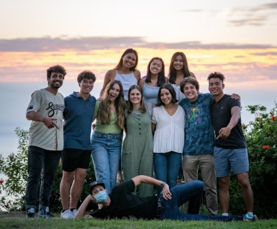 Frank Aulenta Alpha group posing on campus at sunset